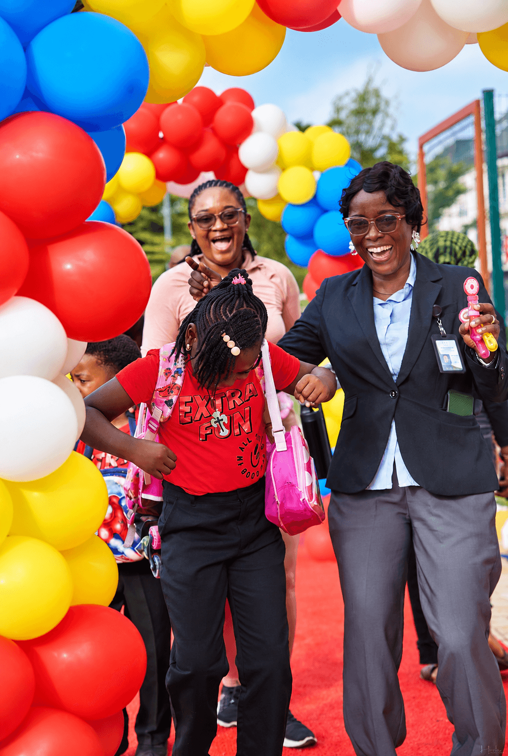 Teacher and student celebrating with joy